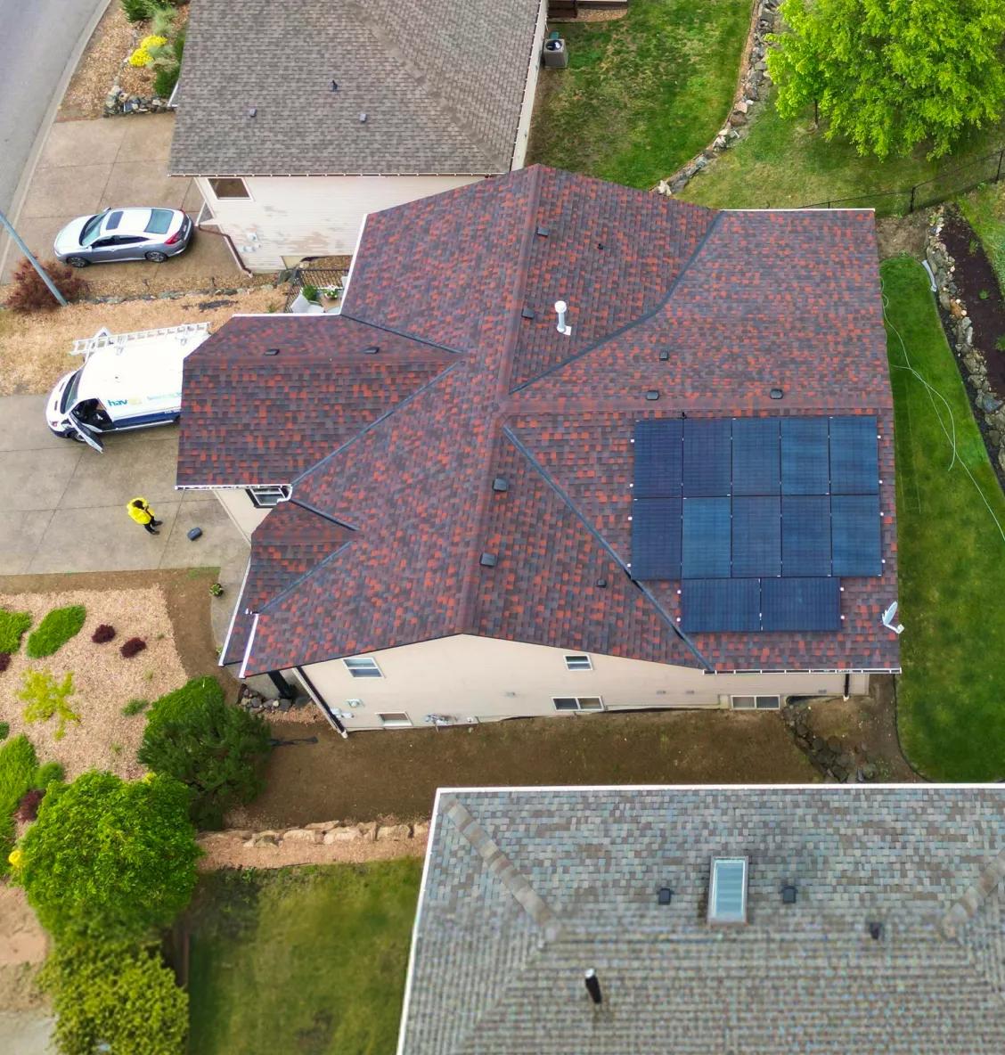 Side-angle view of a complete residential solar system on a BC home, highlighting how renewable energy adds property value and modern aesthetic appeal.