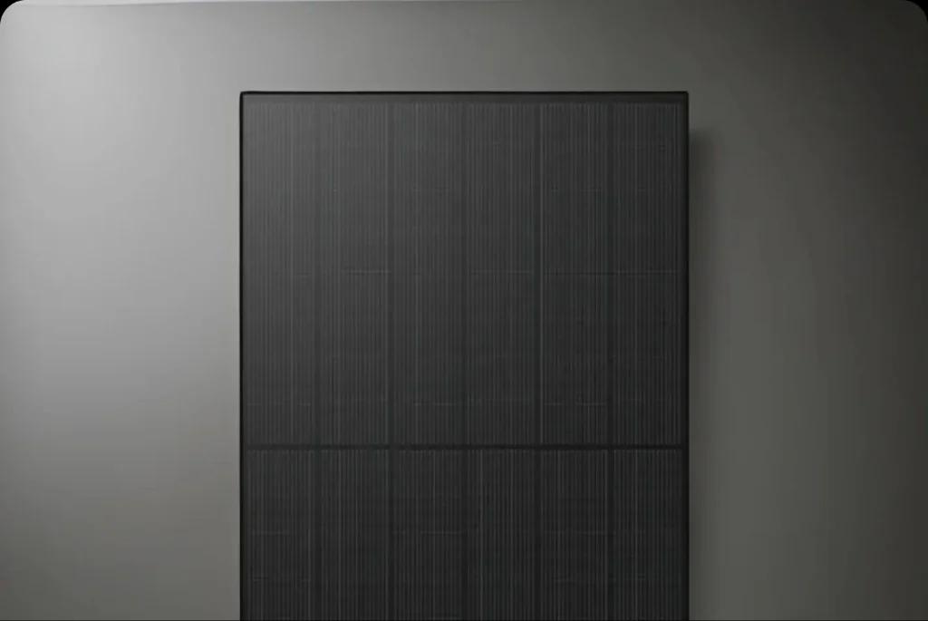 LONGi monocrystalline solar panel on a grey studio background