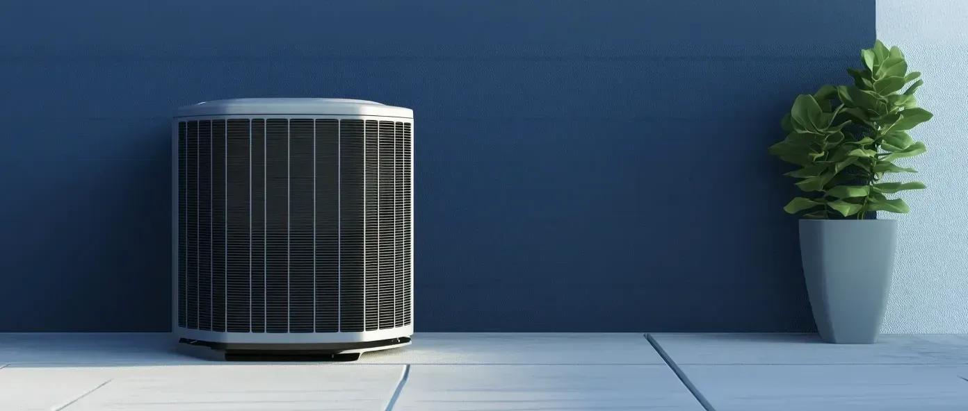 An outdoor energy-efficient central HVAC heat pump system compressor unit installed next to a residential property.